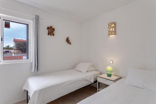 Postel nebo postele na pokoji v ubytování Luxury Oceanfront Villa