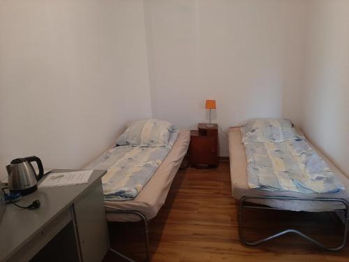 מיטה או מיטות בחדר ב-EKOTURYSTYKA W RAJU