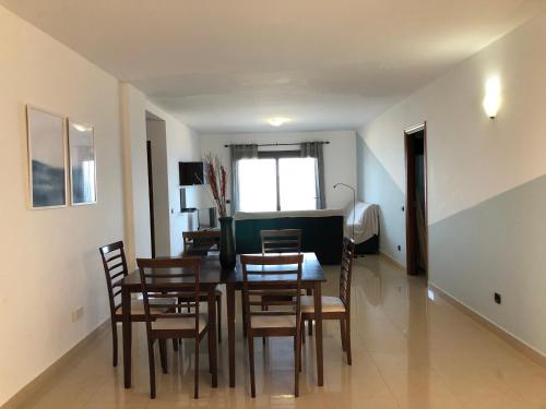 a dining room with a table and chairs at Cotillo Ocean View in El Cotillo