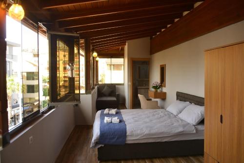 Ένα ή περισσότερα κρεβάτια σε δωμάτιο στο Pure Diamond Hotel