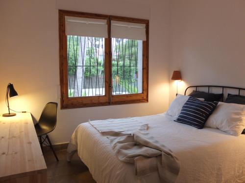 Säng eller sängar i ett rum på Entre Pinos P1 Beach Apartment