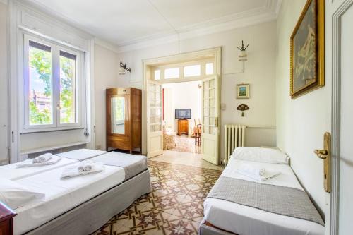 A bed or beds in a room at Trastevere Decò Apartment