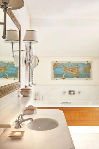 a bathroom with a sink and a mirror at Caruso, A Belmond Hotel, Amalfi Coast in Ravello