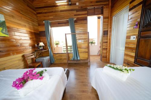 Postel nebo postele na pokoji v ubytování Diep Le Homestay