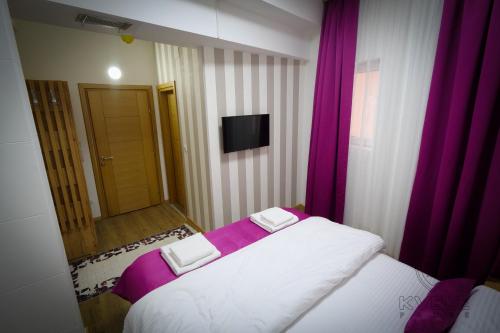 Ένα ή περισσότερα κρεβάτια σε δωμάτιο στο Motel KVELE