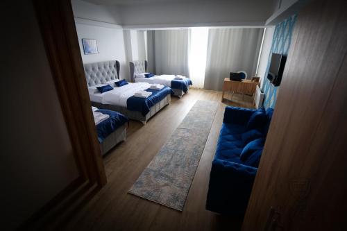 Ένα ή περισσότερα κρεβάτια σε δωμάτιο στο Motel KVELE