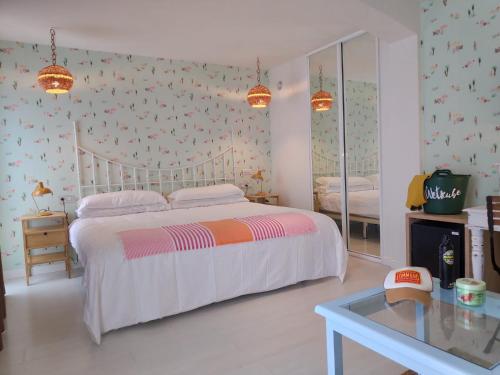 Hotel Mar Azul & Surfにあるベッド