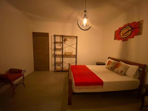 A bed or beds in a room at Om Tourist Residence