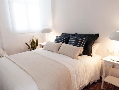 Postel nebo postele na pokoji v ubytování Casa Blanca Beach Apartment