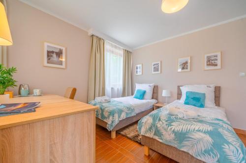 Postel nebo postele na pokoji v ubytování Willa Montis