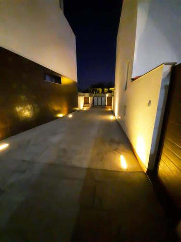 an empty hallway of a building at night at VILLA TAZA DE PLATA A in Huétor Vega