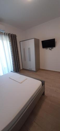 Ein Bett oder Betten in einem Zimmer der Unterkunft South Coast Villa