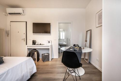 Postel nebo postele na pokoji v ubytování Emilia Suite Essence