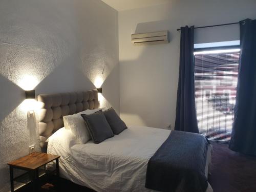 Hostal Cuzcoにあるベッド