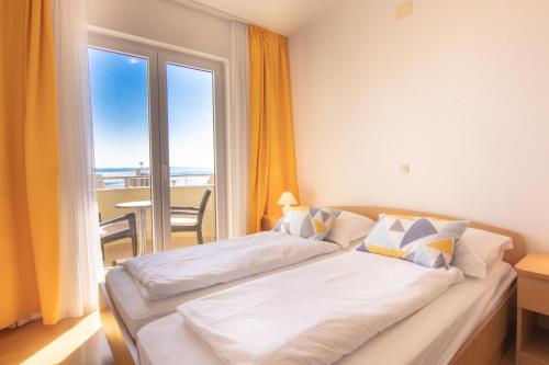 Postel nebo postele na pokoji v ubytování Steko Accomodations
