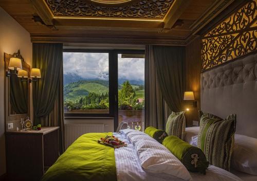 Grand Hotel**** Bachledka Strachanにあるベッド