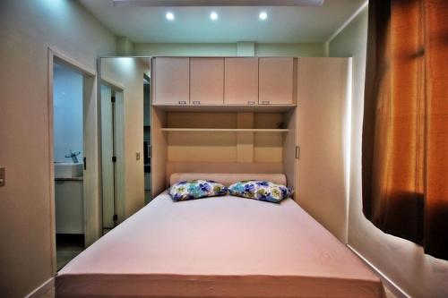 מיטה או מיטות בחדר ב-Rio Spot Ipanema C011