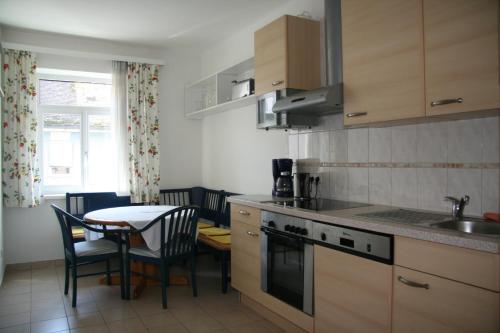 Kuchyňa alebo kuchynka v ubytovaní Apartments Wirrer