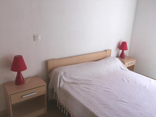 Ліжко або ліжка в номері Appartement l'Espérou