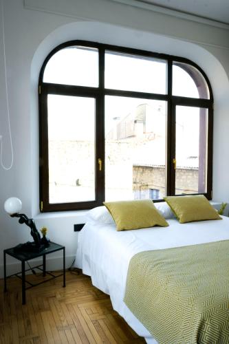 Postel nebo postele na pokoji v ubytování Gran loft en los pinares de Covaleda, Soria