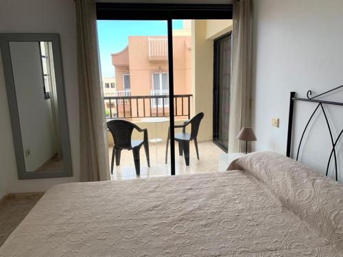 A bed or beds in a room at calle Eusebio Carballo II