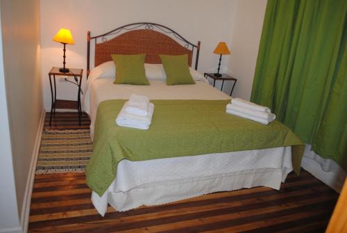 Postelja oz. postelje v sobi nastanitve Hostal Petit Verdot