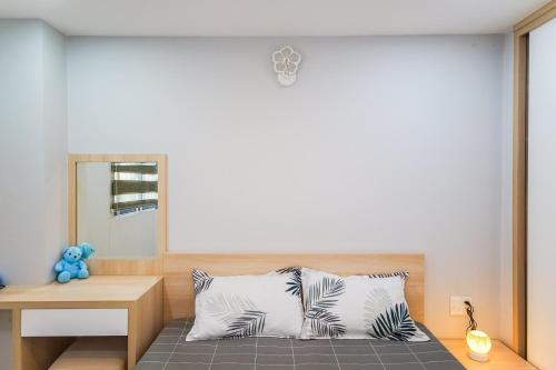 Postel nebo postele na pokoji v ubytování GEM Apartment