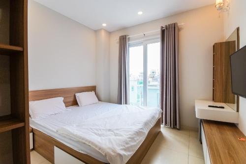 Postel nebo postele na pokoji v ubytování GEM Apartment