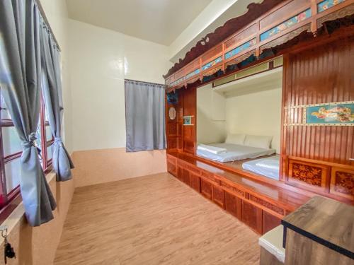 Poschodová posteľ alebo postele v izbe v ubytovaní 琉漾民宿