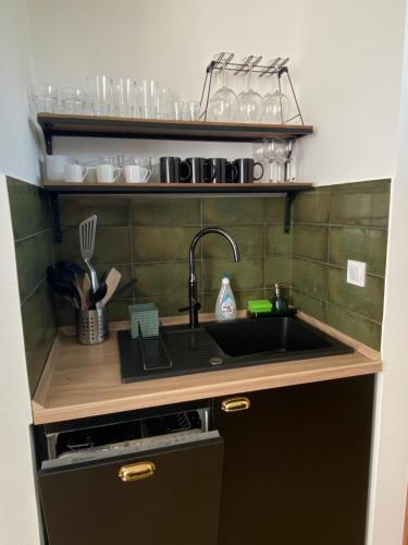 A kitchen or kitchenette at Spirit Homes Apartments