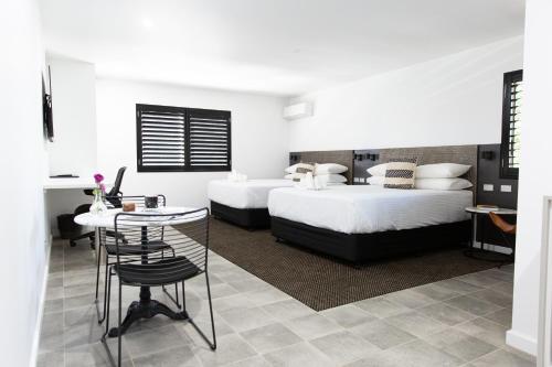 Un pat sau paturi într-o cameră la Fountain View Motel
