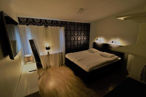 Postel nebo postele na pokoji v ubytování RIBO Apartment Aurora
