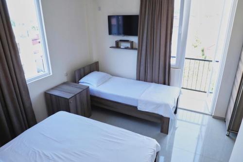 Postel nebo postele na pokoji v ubytování Hotel Estonia Two