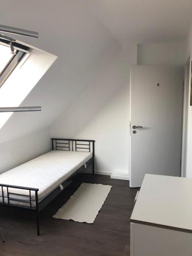Ένα ή περισσότερα κρεβάτια σε δωμάτιο στο Gästehaus Cremlingen