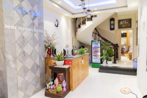 Η κουζίνα ή μικρή κουζίνα στο Aqua Nhu Huynh Hotel