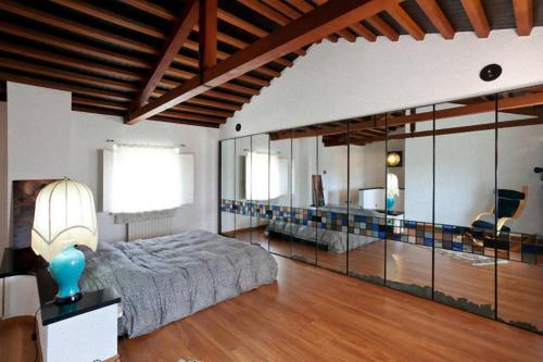 Ένα ή περισσότερα κρεβάτια σε δωμάτιο στο Agriturismo Antico Podere Il Polveraio
