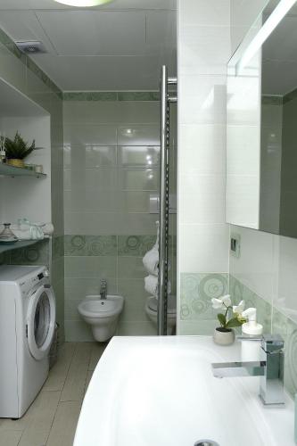 a bathroom with a shower and a toilet and a sink at Casa Nanà Amalfi Coast in Vietri sul Mare