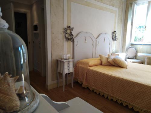 Ένα ή περισσότερα κρεβάτια σε δωμάτιο στο La Cabana Cinque Terre Monterosso
