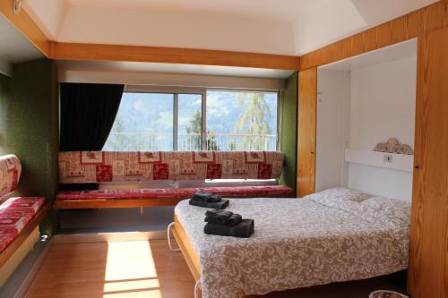 En eller flere senge i et værelse på IL Gatto delle Nevi