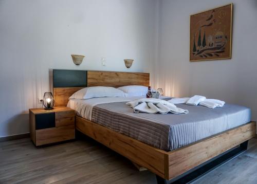 Säng eller sängar i ett rum på SKYROS AVRA Residences