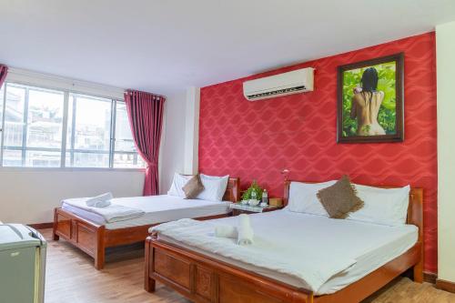 Katil atau katil-katil dalam bilik di Aqua Long Son Hotel
