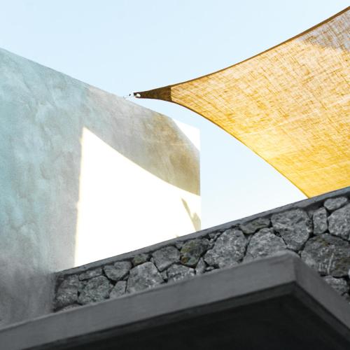a close up of a building with a stone wall at Mimi and Coco Villas Corfu in Paramonas