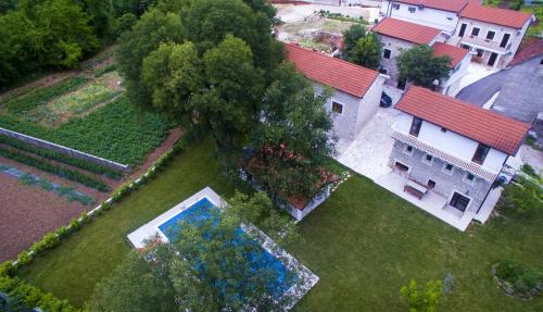 an aerial view of a house with a yard at Stara kuća Estate in Ljubuški