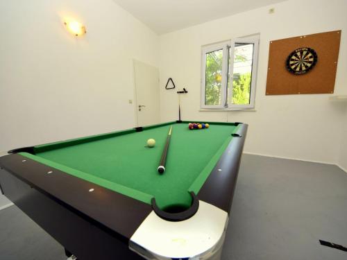 a billiard room with a pool table in it at Holiday Home Mirko by Interhome in Vinišće
