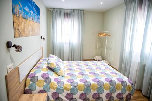 Postel nebo postele na pokoji v ubytování La Casa de los Bisa