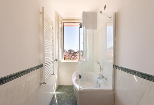 Kylpyhuone majoituspaikassa Hotel Dei Tigli
