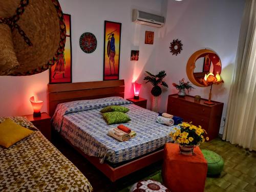 A bed or beds in a room at Villa Loriand