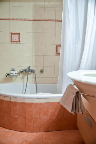 Koupelna v ubytování Homie Apartment next to Acropolis