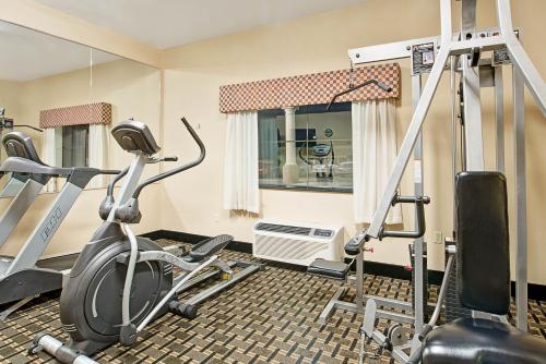 a gym with two tread machines in a room at Baymont by Wyndham Decatur in Decatur
