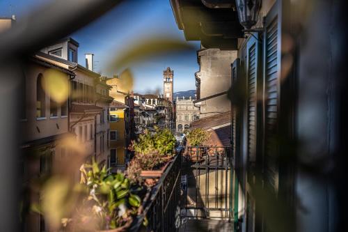 Balkón nebo terasa v ubytování Relais Balcone di Giulietta